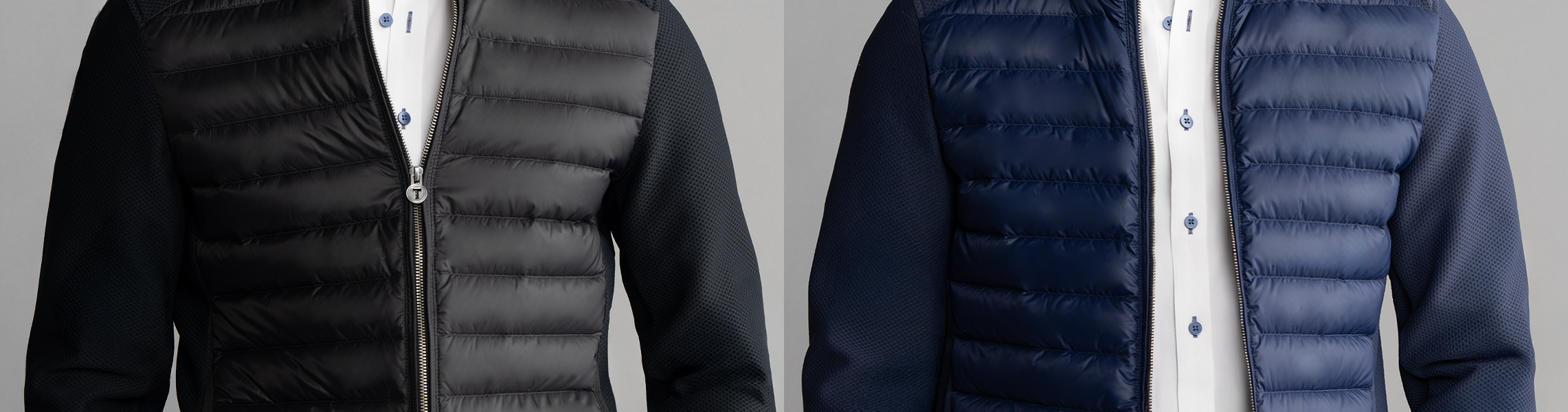 Side-by-side view of two men wearing padded jackets—one black, one navy blue—over white button-up shirts, both jackets unzipped to reveal the shirts underneath. Only torsos are visible.