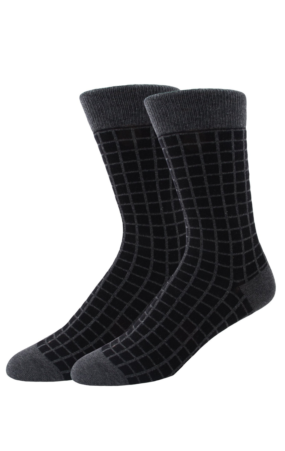 A pair of Twillory "Jail" crew socks in black with a thin grey grid pattern. The toes, heels, and cuffs are solid dark grey, contrasting with the patterned body. Displayed side by side on a white background.