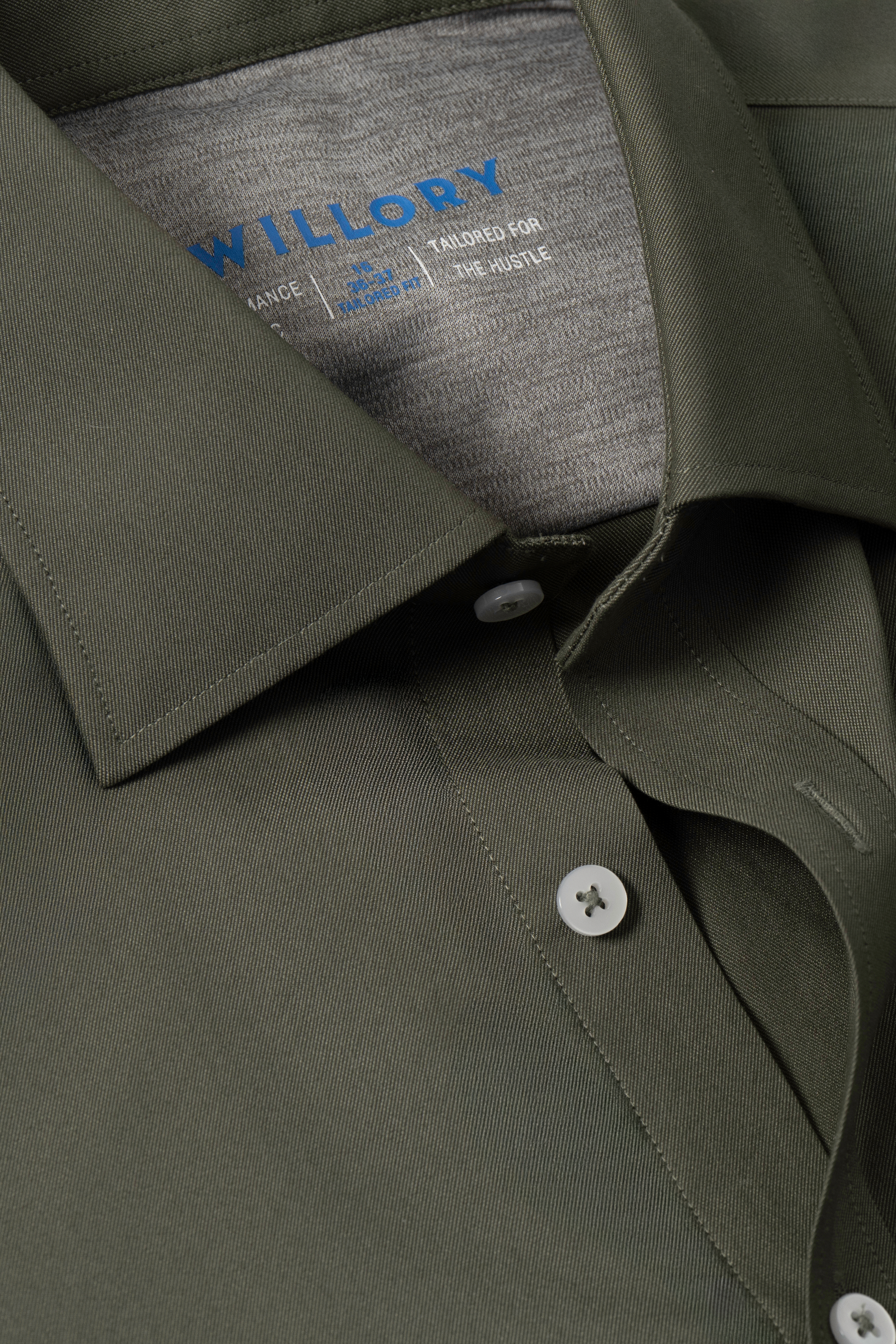 A close-up of the Twillory Leader Solid // Olive shirt, featuring 4-way stretch and moisture-wicking fabric for optimal comfort.