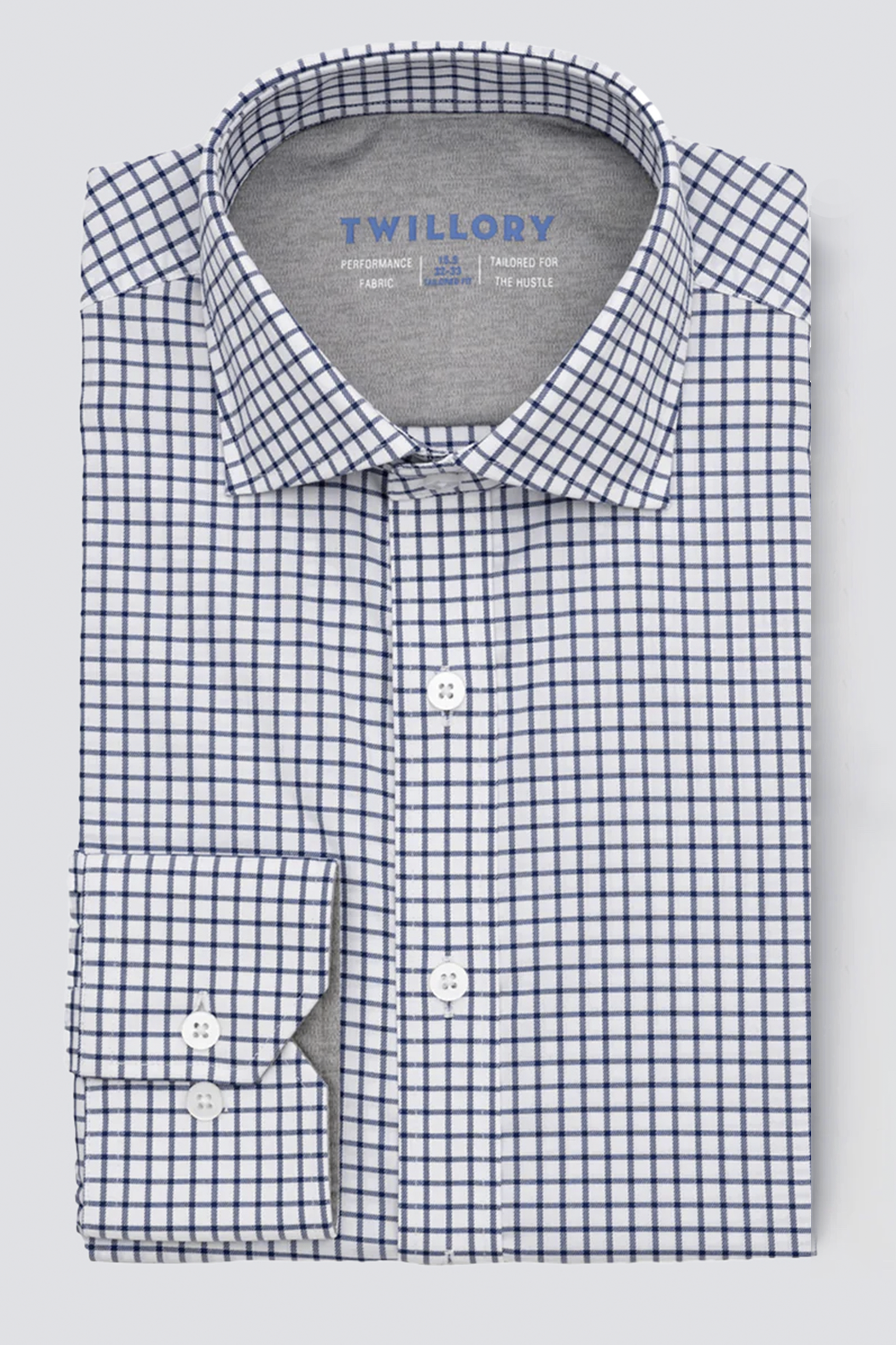 A close-up of the Twillory Leader Windowpane // Navy performance shirt, crafted with moisture-wicking fabric to keep you dry and comfortable all day.