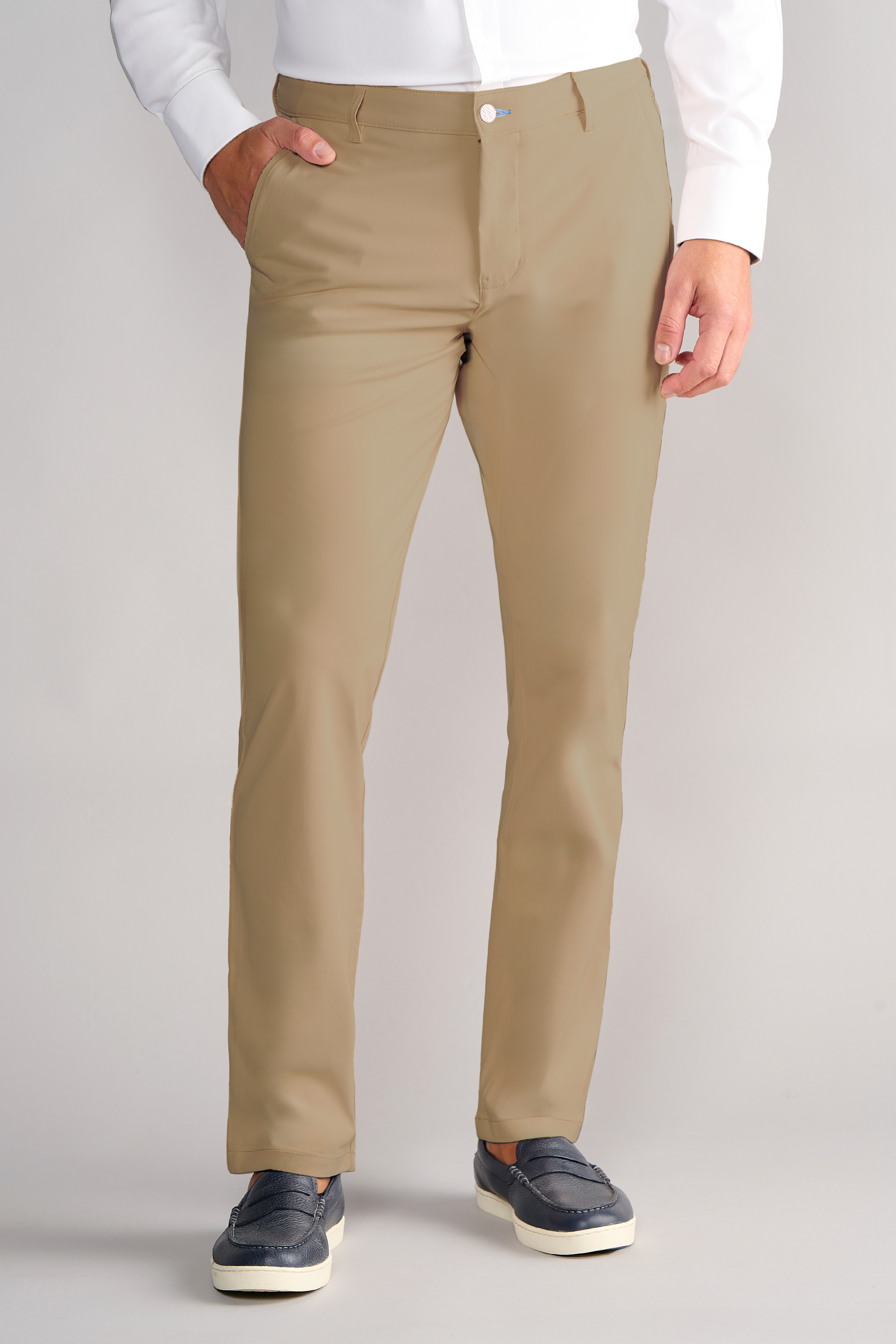 A person wearing Twillory Performance Pants in Khaki.
